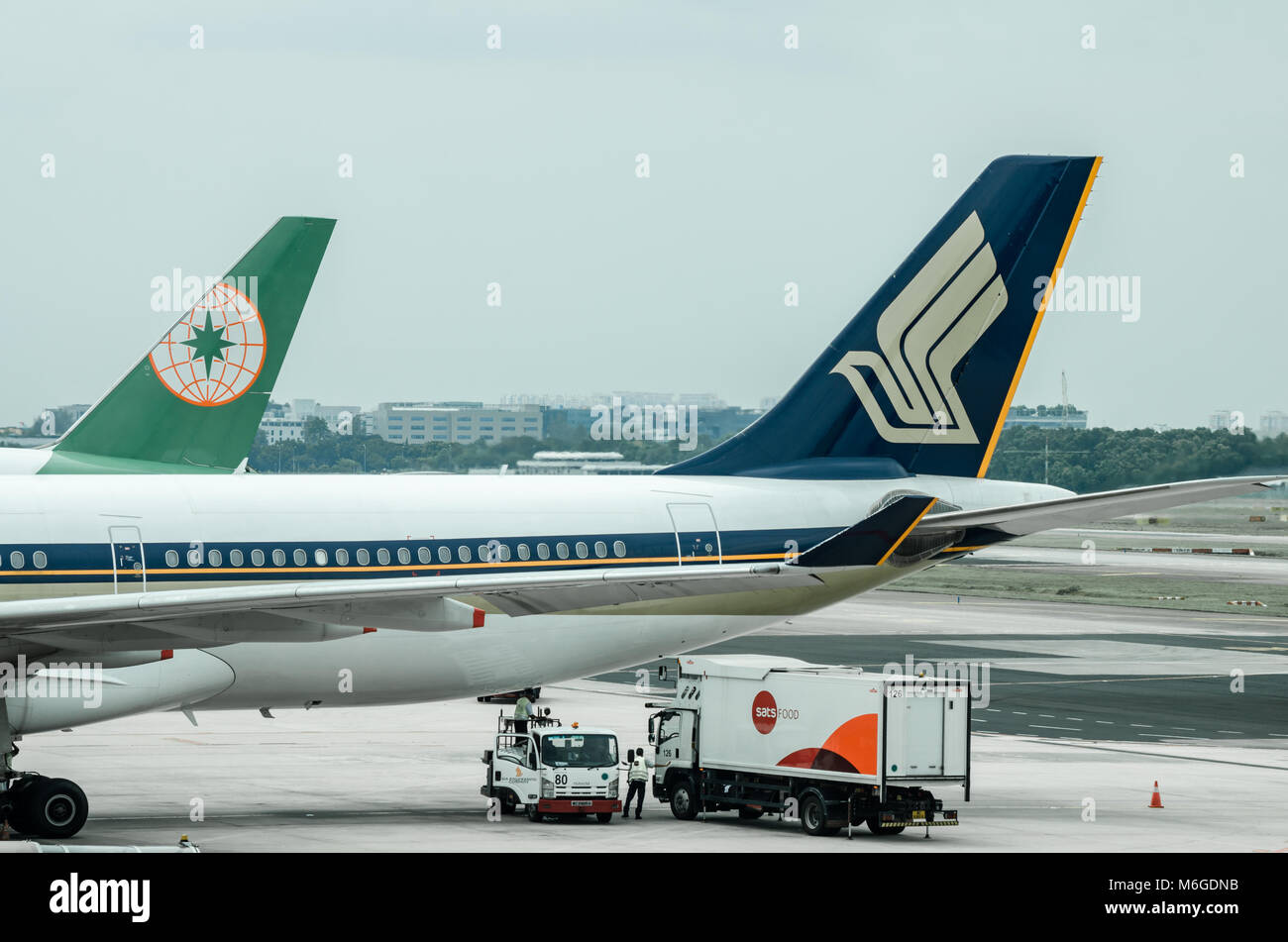 Singapore Airlines is the flag carrier airline of Singapore with its hub at Singapore Changi Airport. The airline was famous for its top notch service Stock Photo