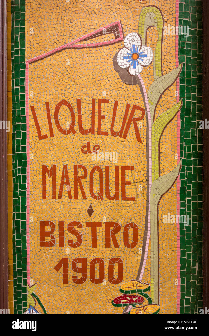 Liqueur de Marque (branded liqueur) mosaic sign at Relais Odeon, Cour du Commerce-Saint-André, Paris, France Stock Photo
