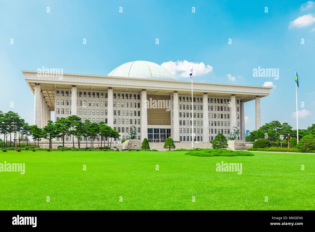 SEOUL, KOREA - AUGUST 14, 2015: Building of National Assembly Proceeding Hall - South Korean Capitol building - located on Yeouido island - Seoul, Rep Stock Photo