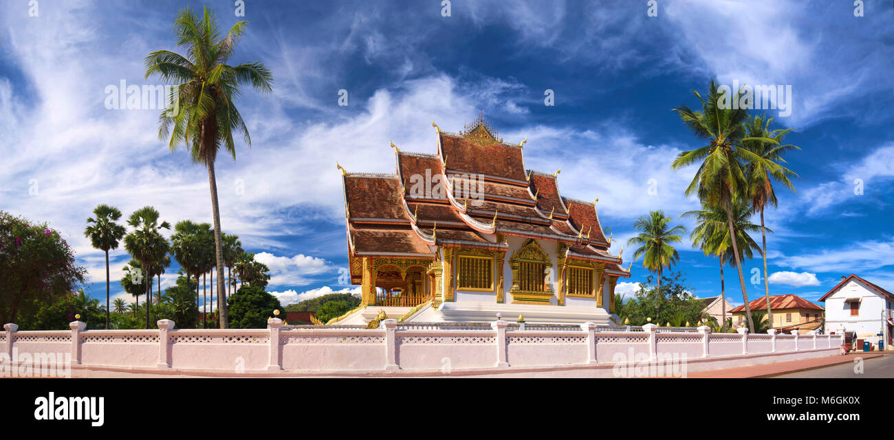 Sunny day, Buddhist temple at the royal palace complex in Luang Prabang, near Nam Kham and the Mekhong river, Laos Stock Photo