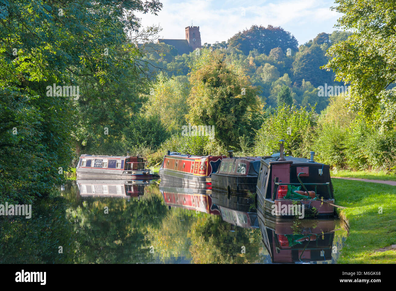 Narrow boats / barges moored on a canal in Kinver Staffordshire UK Stock Photo
