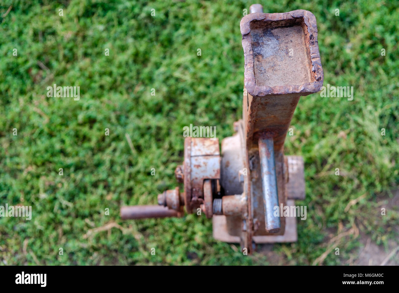 House lifting jack. Old rusty mechanical screw jack. Close-up Stock Photo