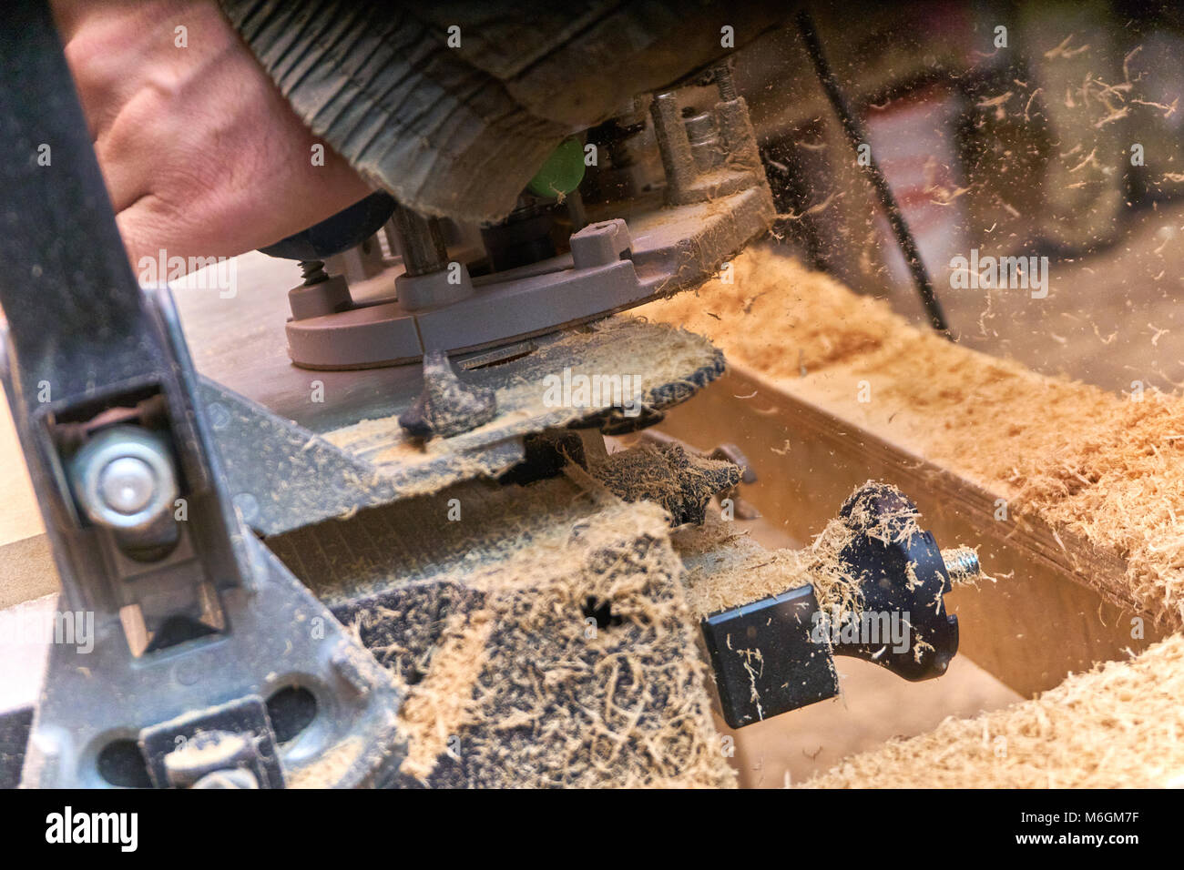 Dovetail joint. Woodworking and carpentry production. Part of a wooden