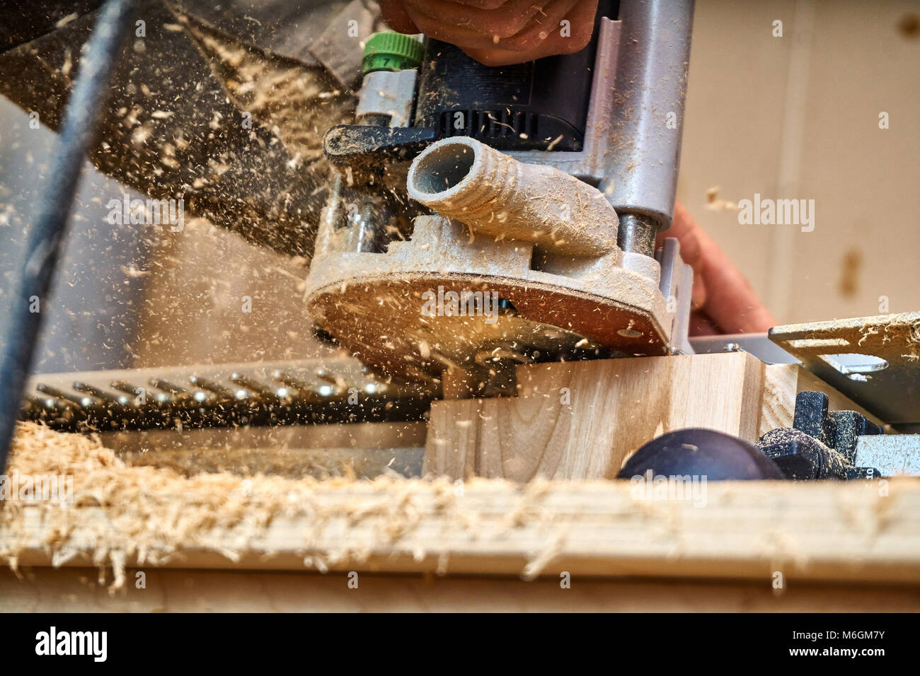 Dovetail joint. Woodworking and carpentry production. Part of a wooden