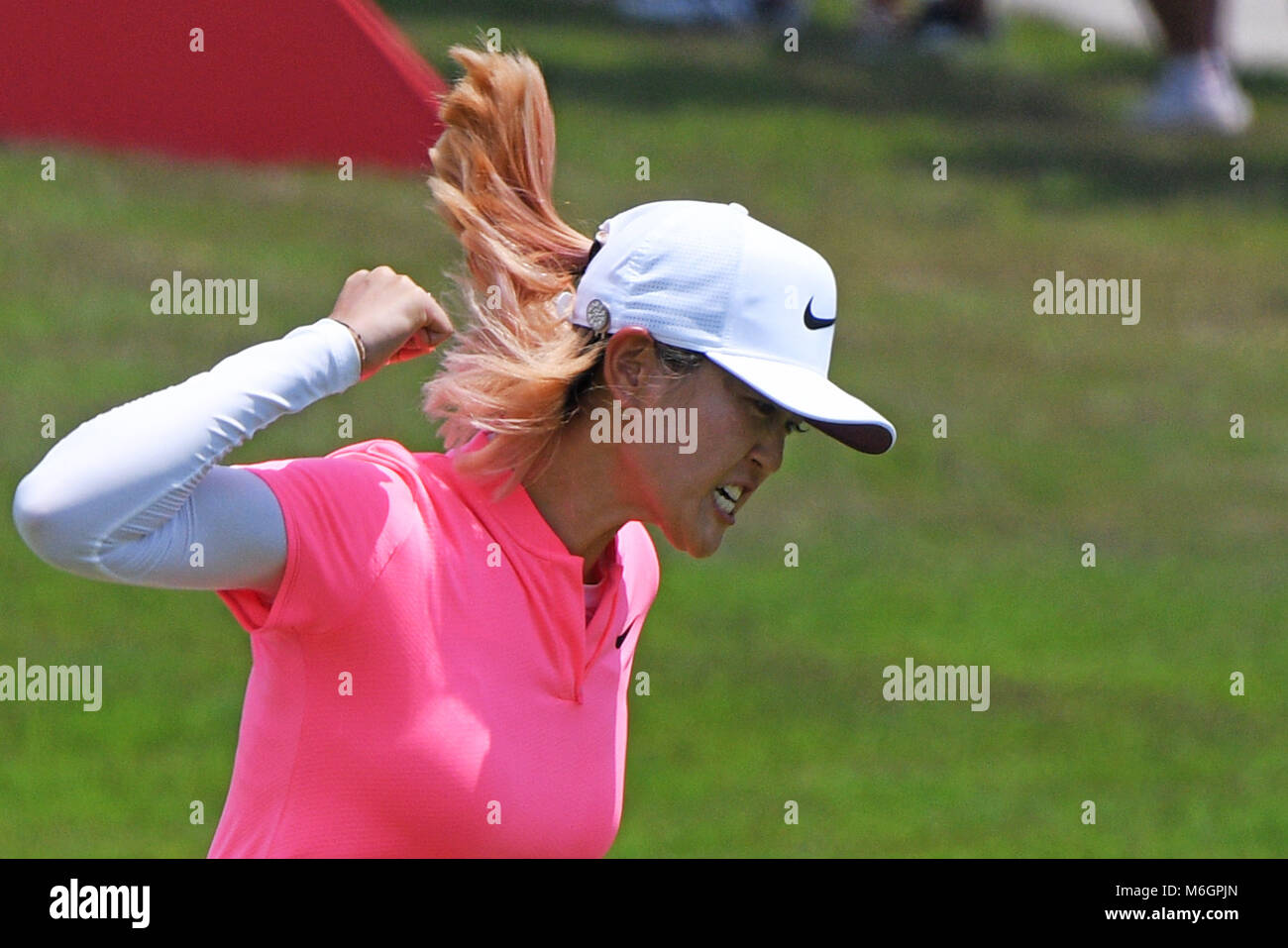 Singapore. 4th Mar, 2018. Michelle Wie of the United States celebrates after winning the HSBC Women's World Championship at Sentosa Golf Club in Singapore, on March 4, 2018. Credit: Then Chih Wey/Xinhua/Alamy Live News Stock Photo