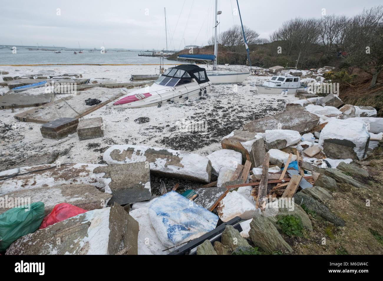 Up to 80 boats that where anchored at Holyhead marina in Anglesey, north Wales have been damaged by gale force winds on March 4, 2018 from the remnants of Storm Emma with some winds reaching 80mph. The coastguard are advising the public to avoid the area whilst they deal with the clean up operation. © Christopher Middleton/Alamy Live News Credit: Christopher Middleton/Alamy Live News Stock Photo