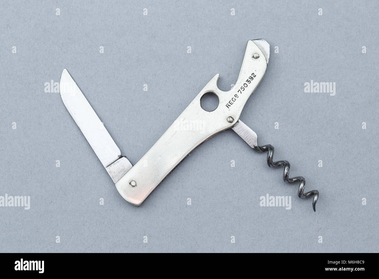 Barman's tool, including a folding knife, corkscrew, cigar cutter, bottle opener, etc.  Made by Willam Rodgers, Sheffield, with a registered design Stock Photo
