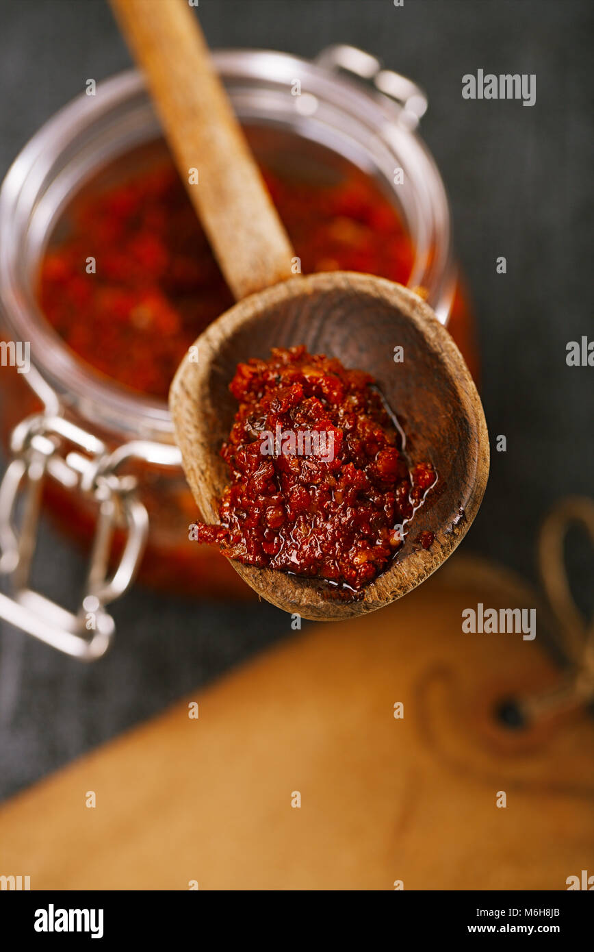 Extreme hot asian chillies garlic paste sauce - Laza or Lazdzhan Stock Photo