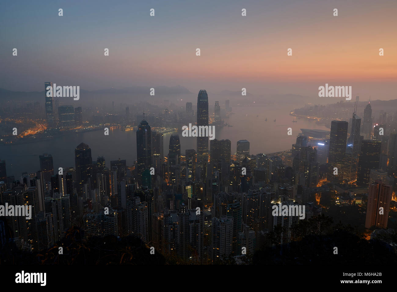 Hong Kong Skyline And Victoria Harbour At Sunrise, Viewed From The Peak ...