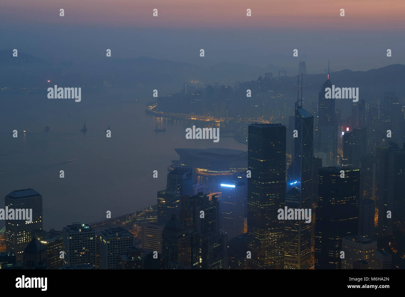 Hong Kong Skyline And Victoria Harbour At Sunrise, Viewed From The Peak ...