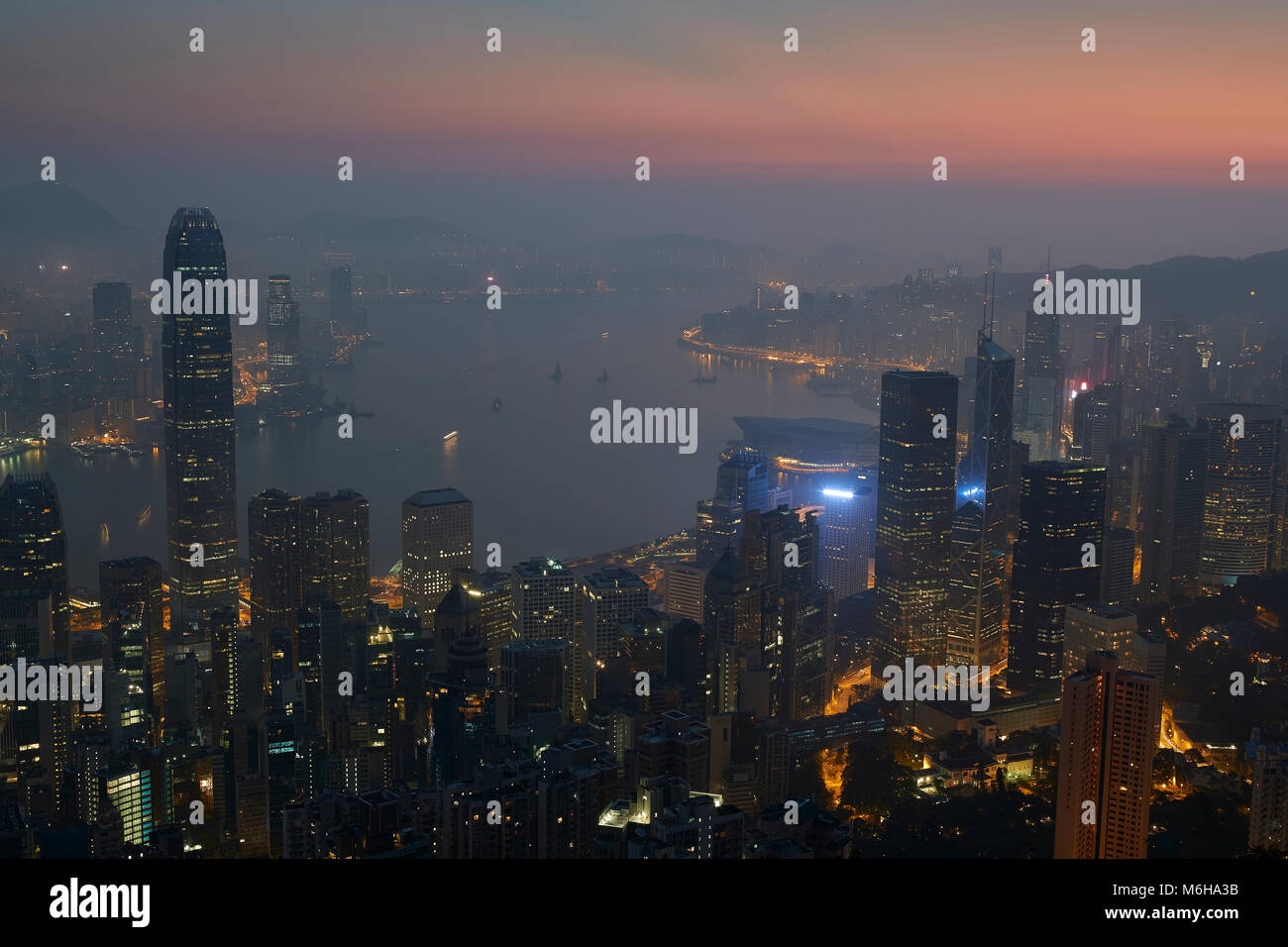 Hong Kong Skyline At Sunrise, Viewed From The Peak Stock Photo - Alamy