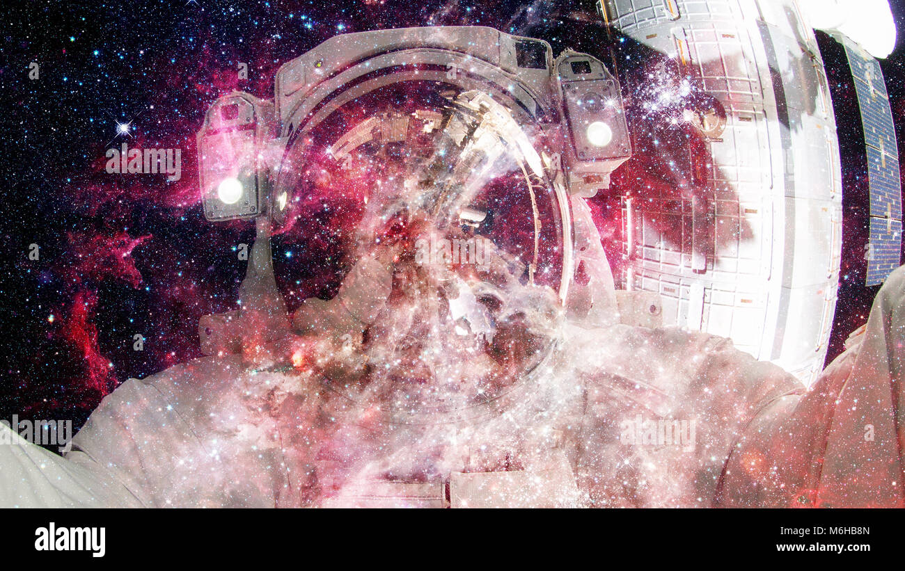 Astronaut in outer space. Science fiction art. Elements of this image ...