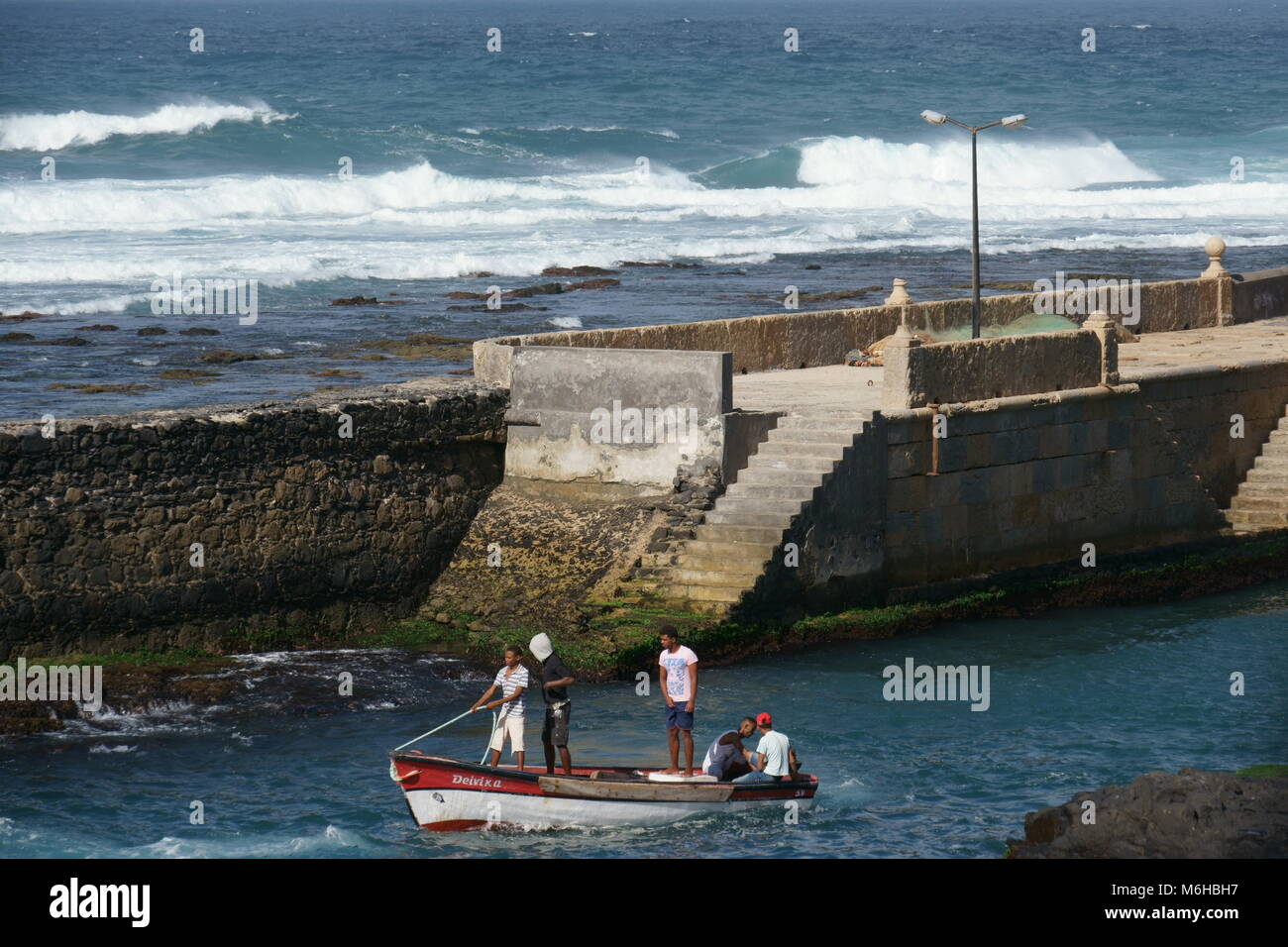 Fishing Boat leaving Boca de Pistola, the Fishing Port of Ponta do Sol, Santo Antao, Cape Verde Stock Photo
