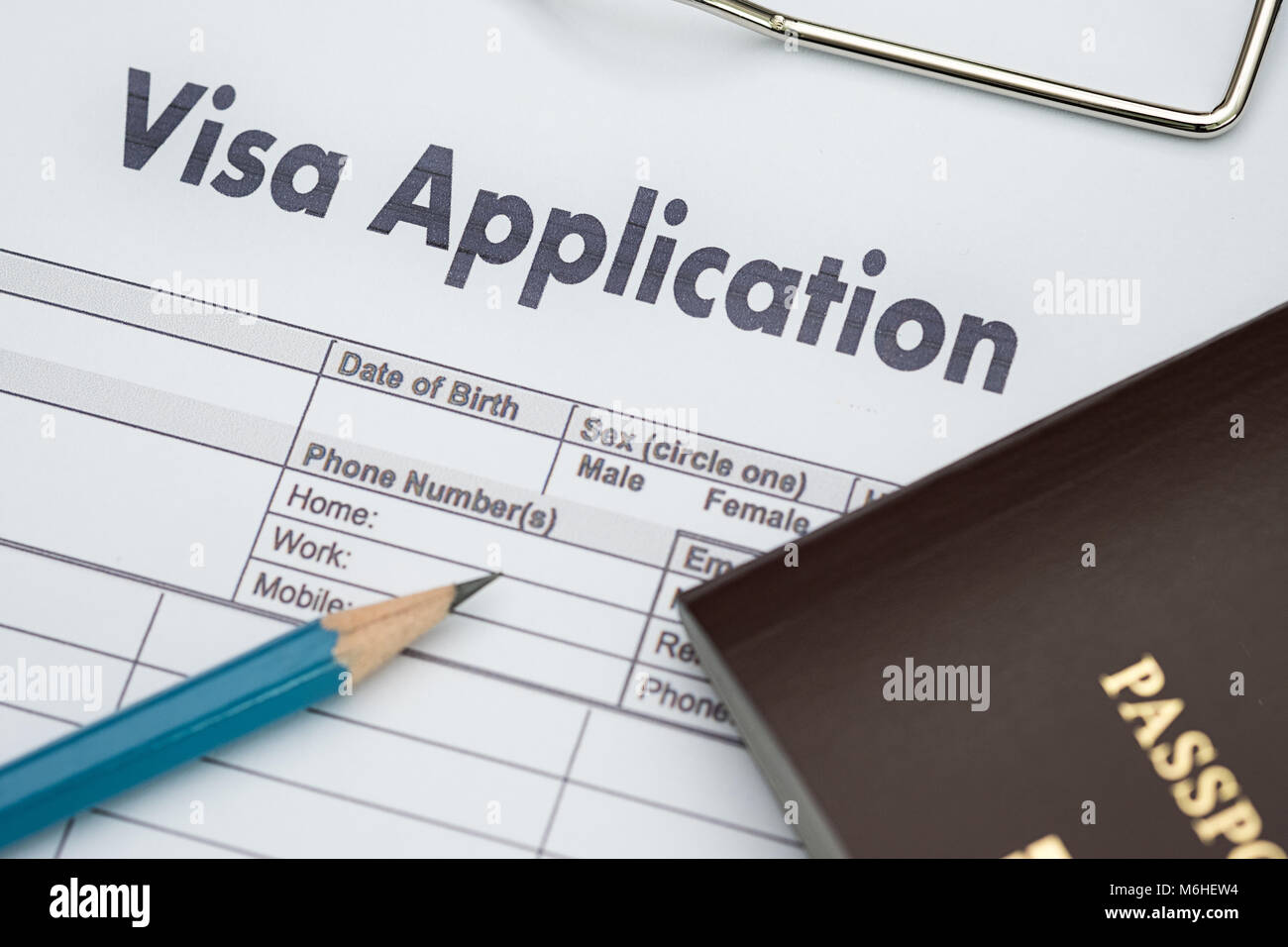Visa application form to travel Immigration a document Money for Passport Map and travel plan Stock Photo