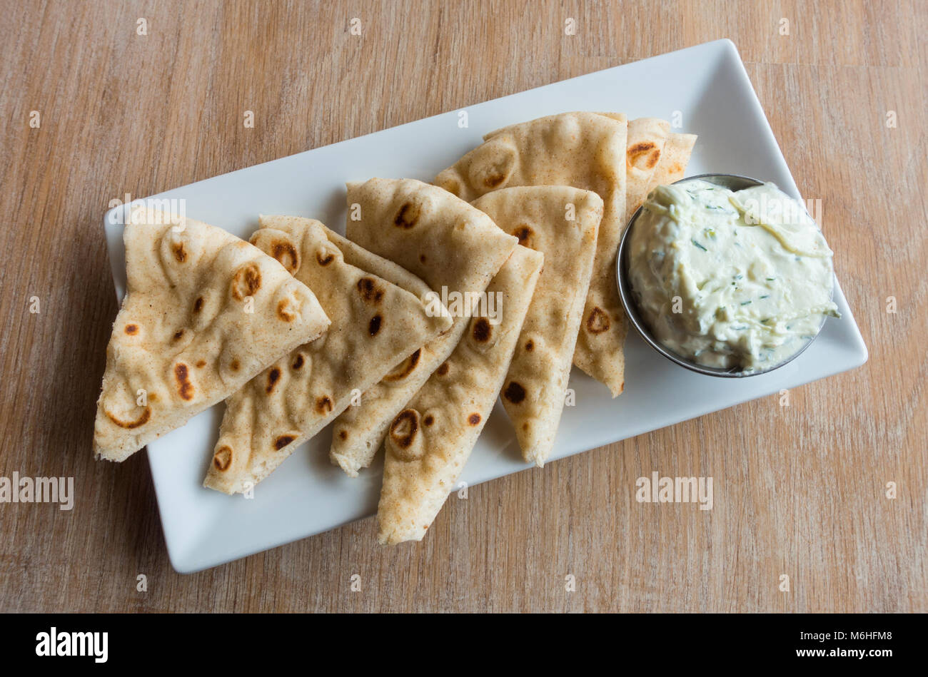 Greek Fava Mani appetizer and fried pita Stock Photo