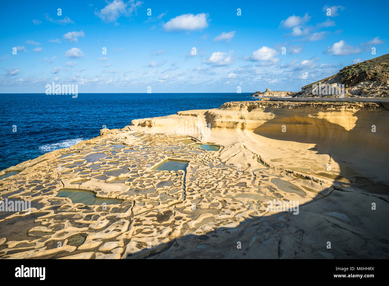 Salt evaporation ponds on Gozo island, Malta Stock Photo