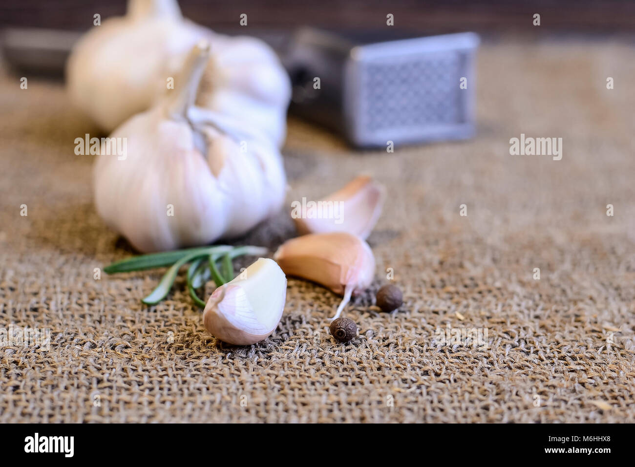 Garlic and cloves lying on a napkin. Healthy food and spices. Ad Stock ...