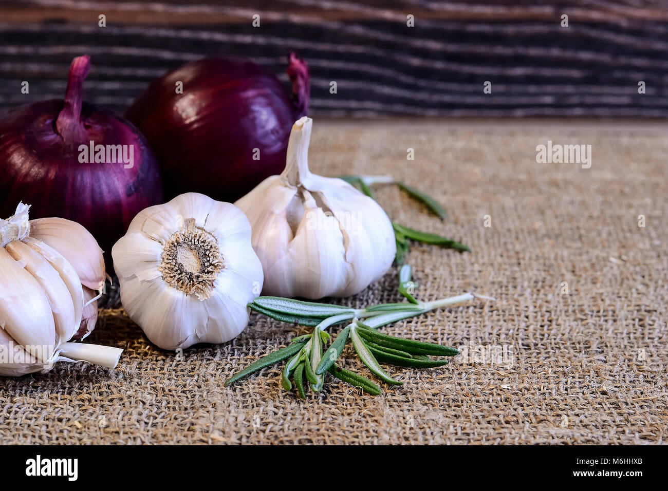 Garlic and cloves lying on a napkin. Healthy food and spices. Ad Stock ...