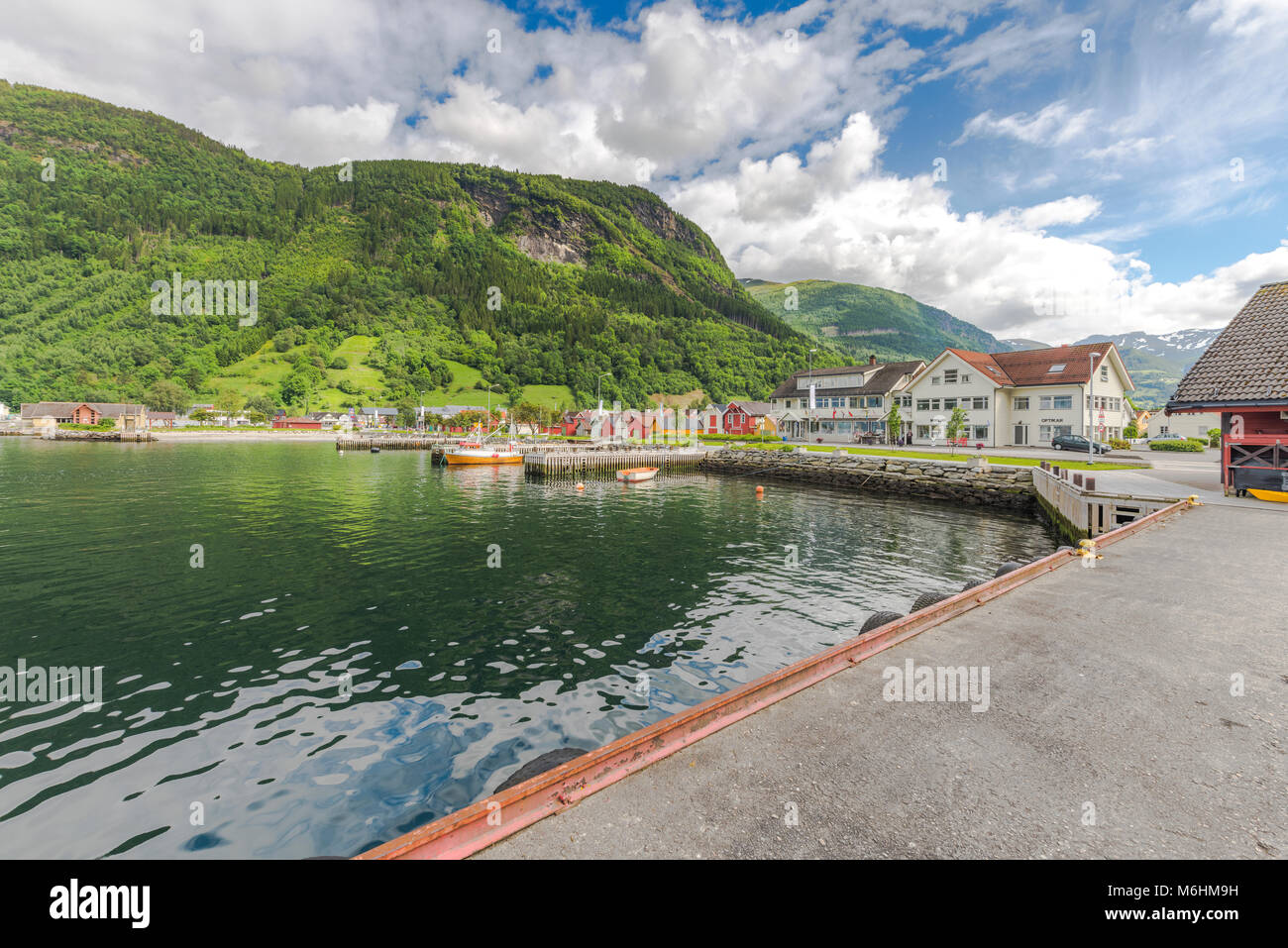 the bay of Vik i Sogn, Norway, view to the boathouses from the landing stage, Sognefjorden Stock Photo