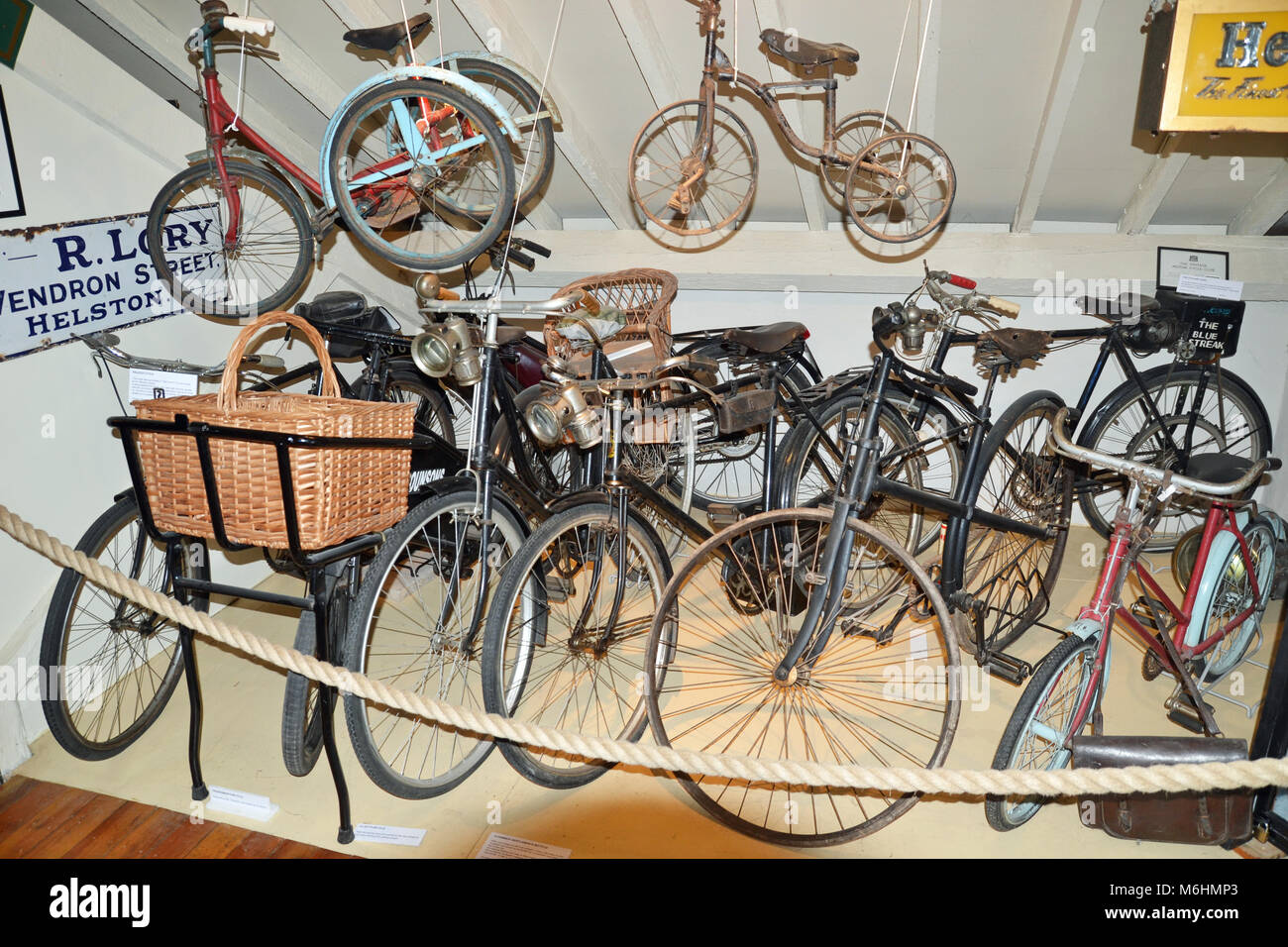 Collection of Old bicycles in Helston Museum, Cornwall, England, UK Stock Photo