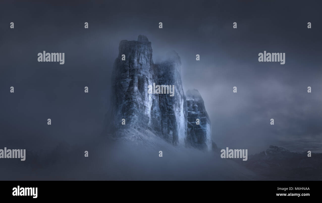 Mystical landscape panorama of famous landmrk Tre Cime di Lavaredo or Drei Zinnen - Dolomites mountain range, Italy. Stock Photo