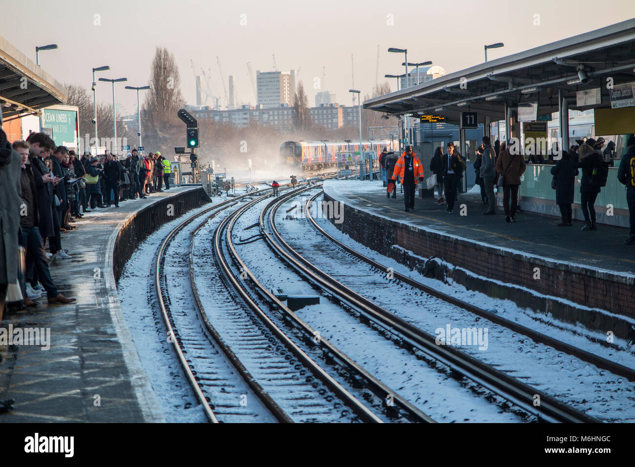 Clapham Junction train station with delays for commuters as a South Western train leaves the platform Stock Photo