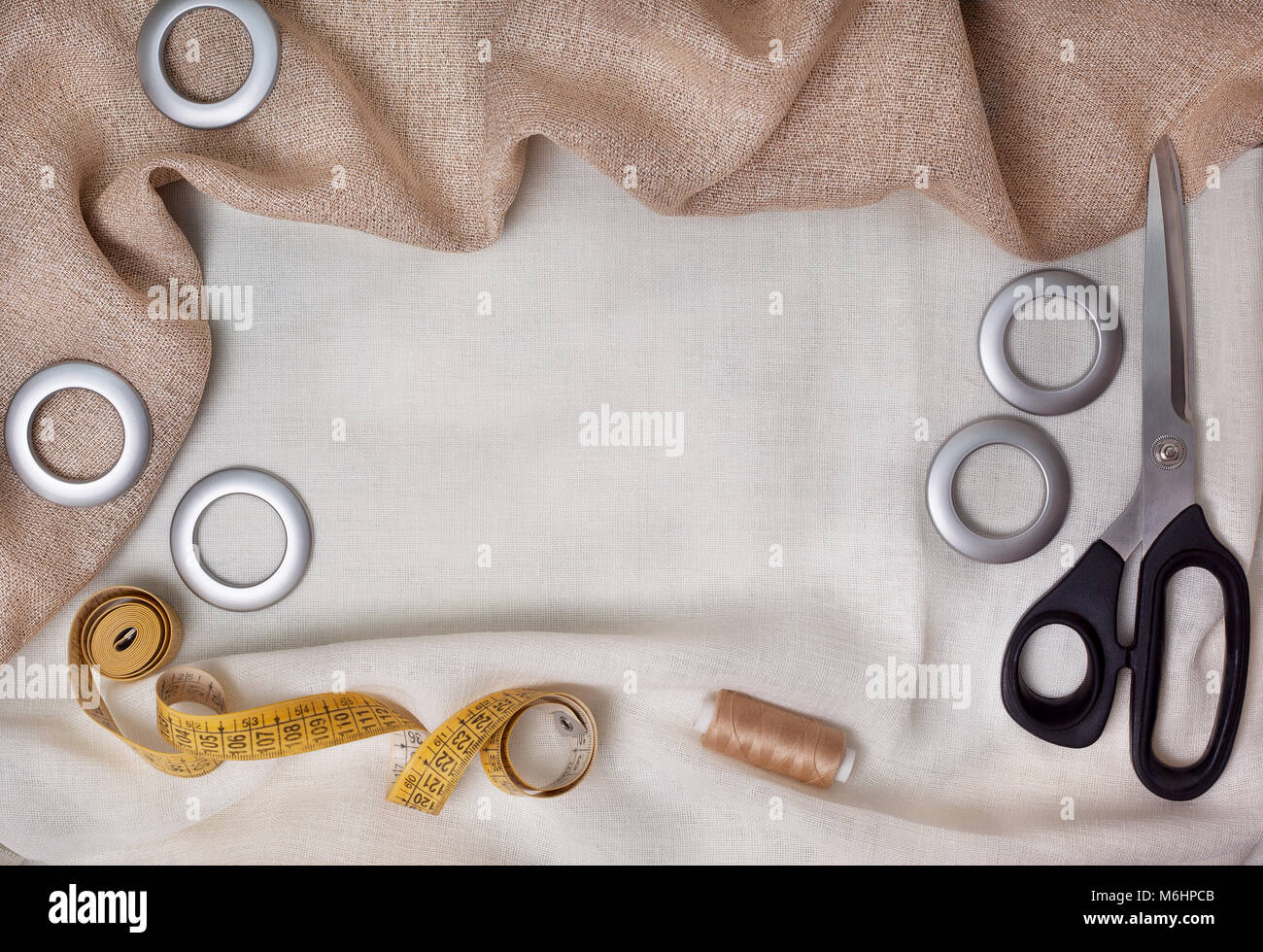 Female hands using wooden tailor ruler to measure cotton fabric. Textile  sale and sewing concept Stock Photo - Alamy