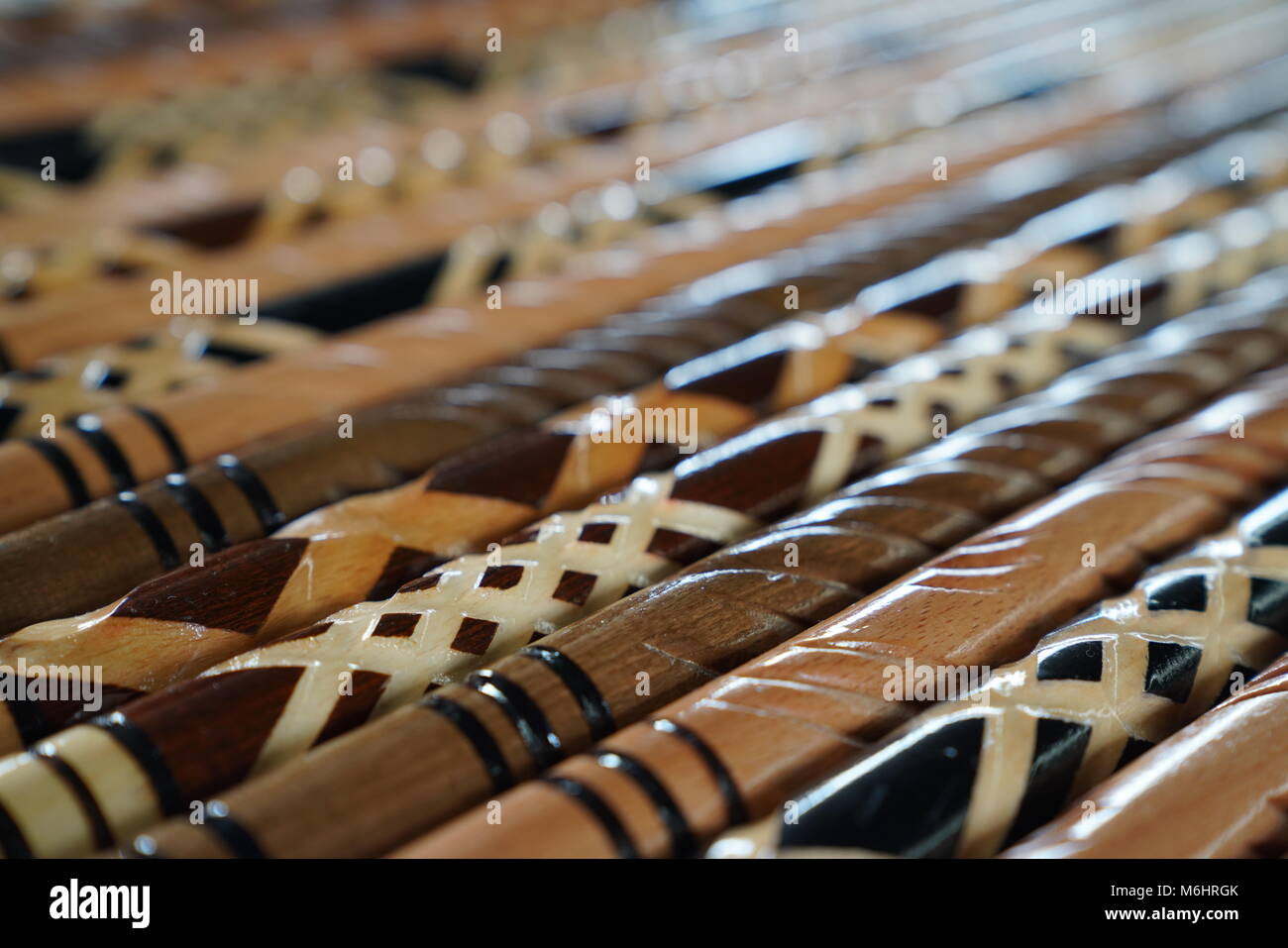 Closeup of wooden walking sticks in different patterns Stock Photo