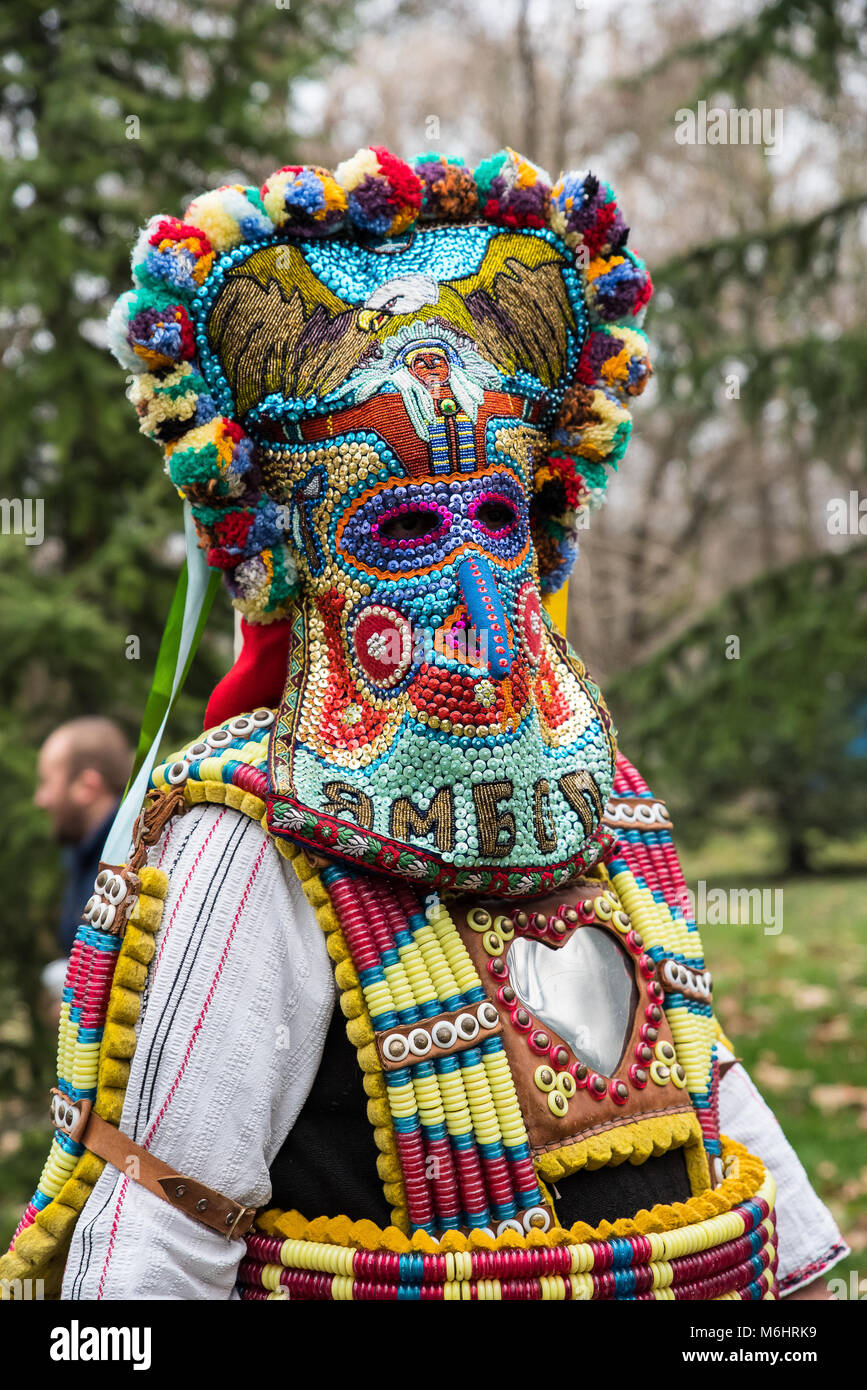 Kukeri, mummers perform rituals with costumes and big bells, intended to scare away evil Stock Photo