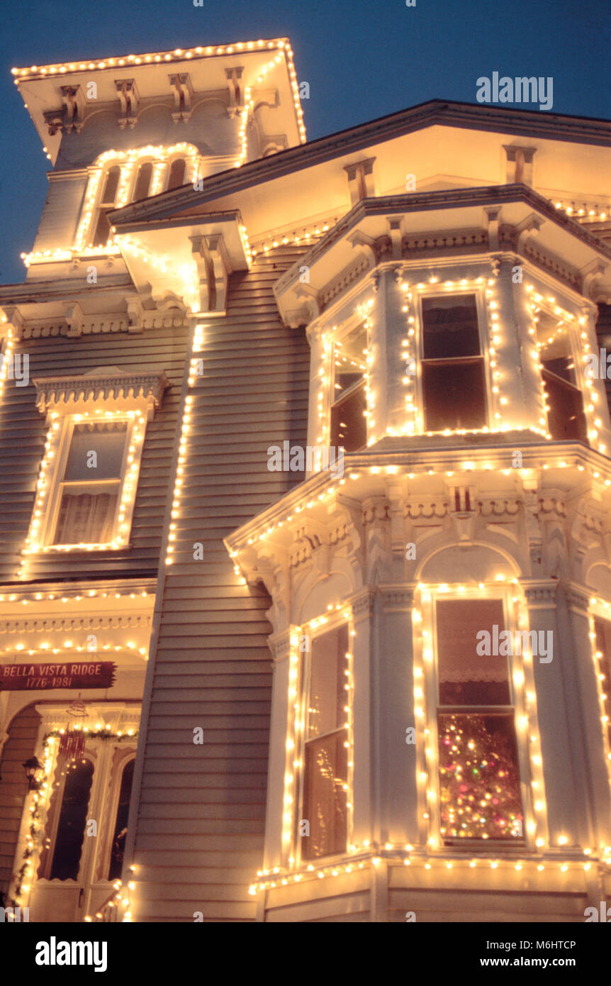 Victorian house decorated for Christmas holiday Stock Photo - Alamy