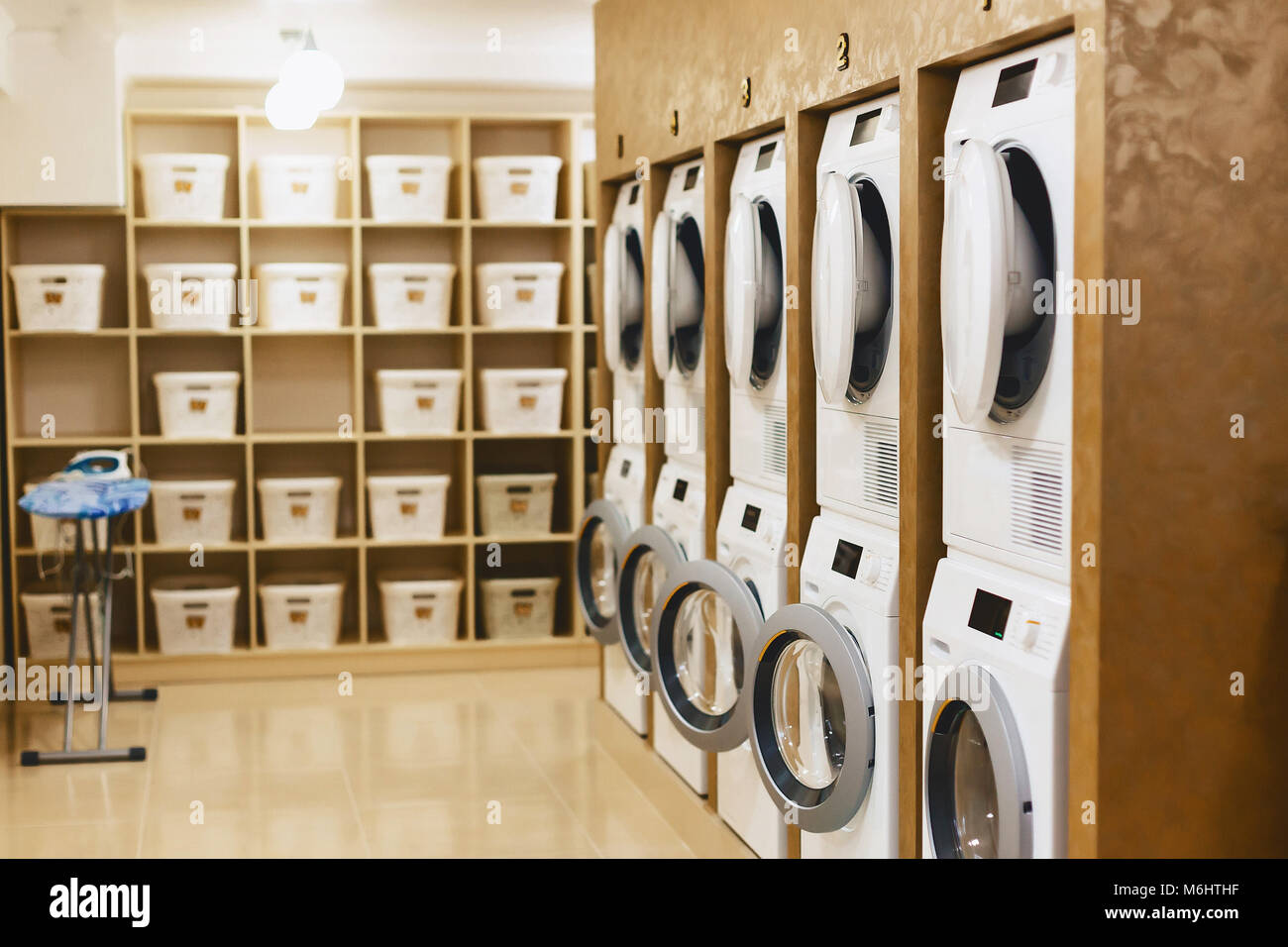 laundry room with driers and dryers with shells Stock Photo Alamy