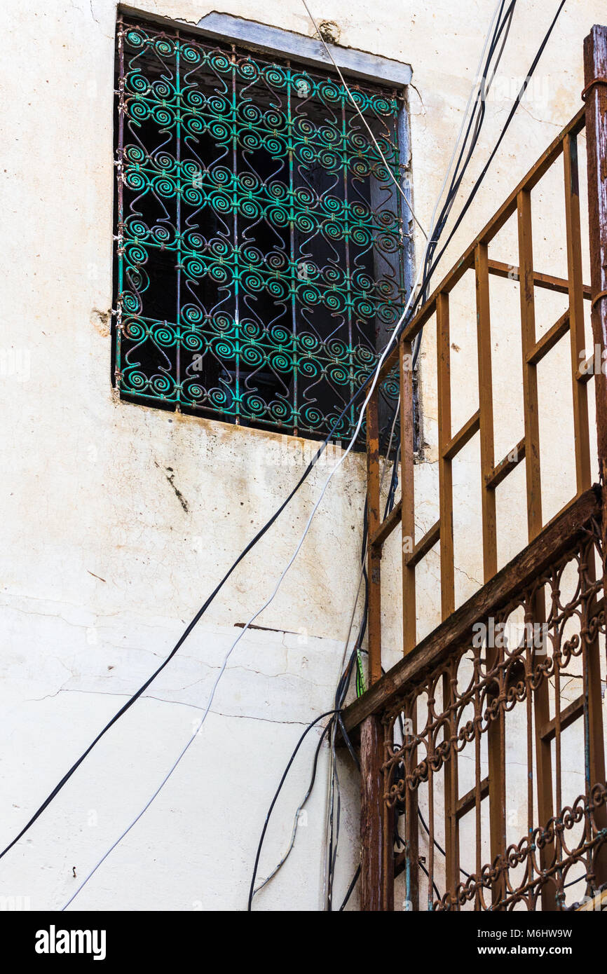 Detail of architectural style of window along Rue des Merinides, in the Mellah or Jewish Quarter of Fes, Morocco Stock Photo