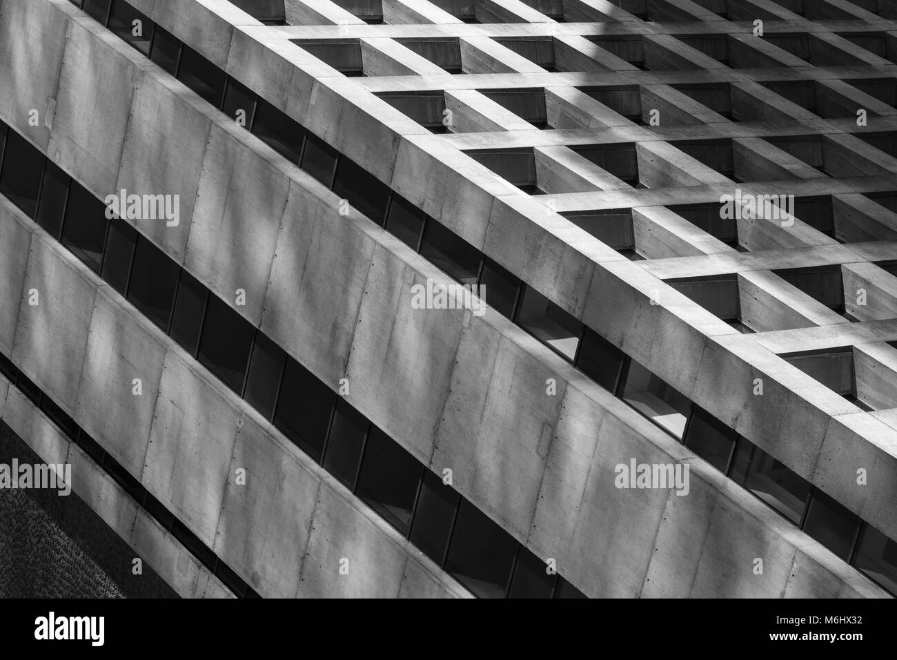 Black and White image of a concrete office tower in downtown Vancouver Stock Photo