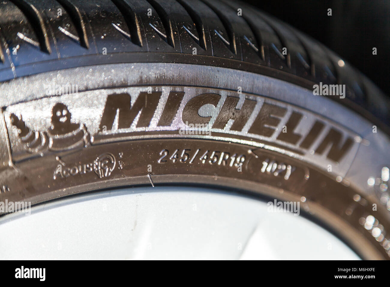 FUERTH / GERMANY - MARCH 4, 2018: Michelin logo on a tire. Michelin is a French tyre manufacturer based in Clermont-Ferrand in the Auvergne région of  Stock Photo
