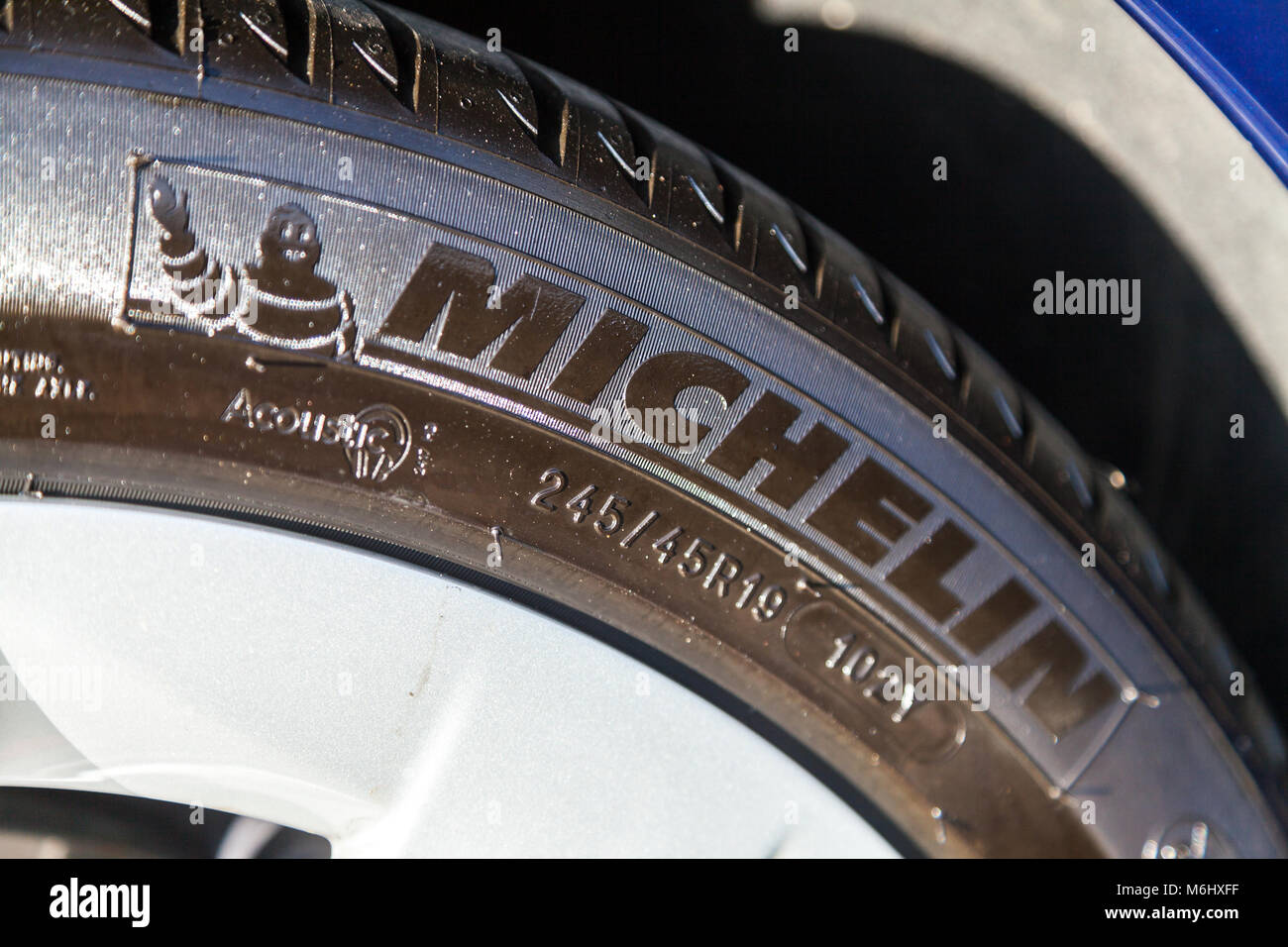 FUERTH / GERMANY - MARCH 4, 2018: Michelin logo on a tire. Michelin is a French tyre manufacturer based in Clermont-Ferrand in the Auvergne région of  Stock Photo