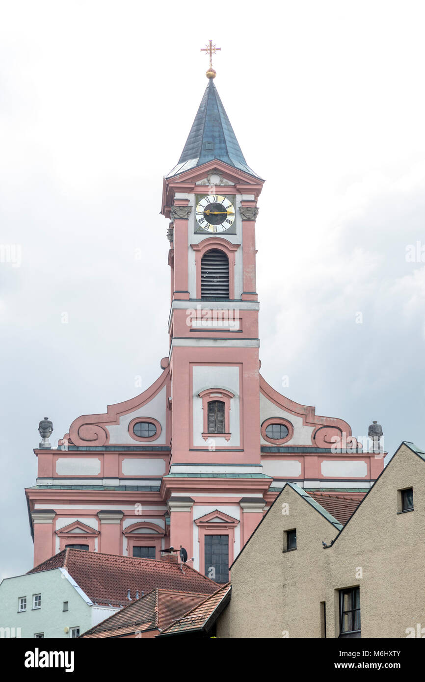 St. Paul's cathedral in Passau ??. The clock tower, spire rises above surrounding buildings. Stock Photo