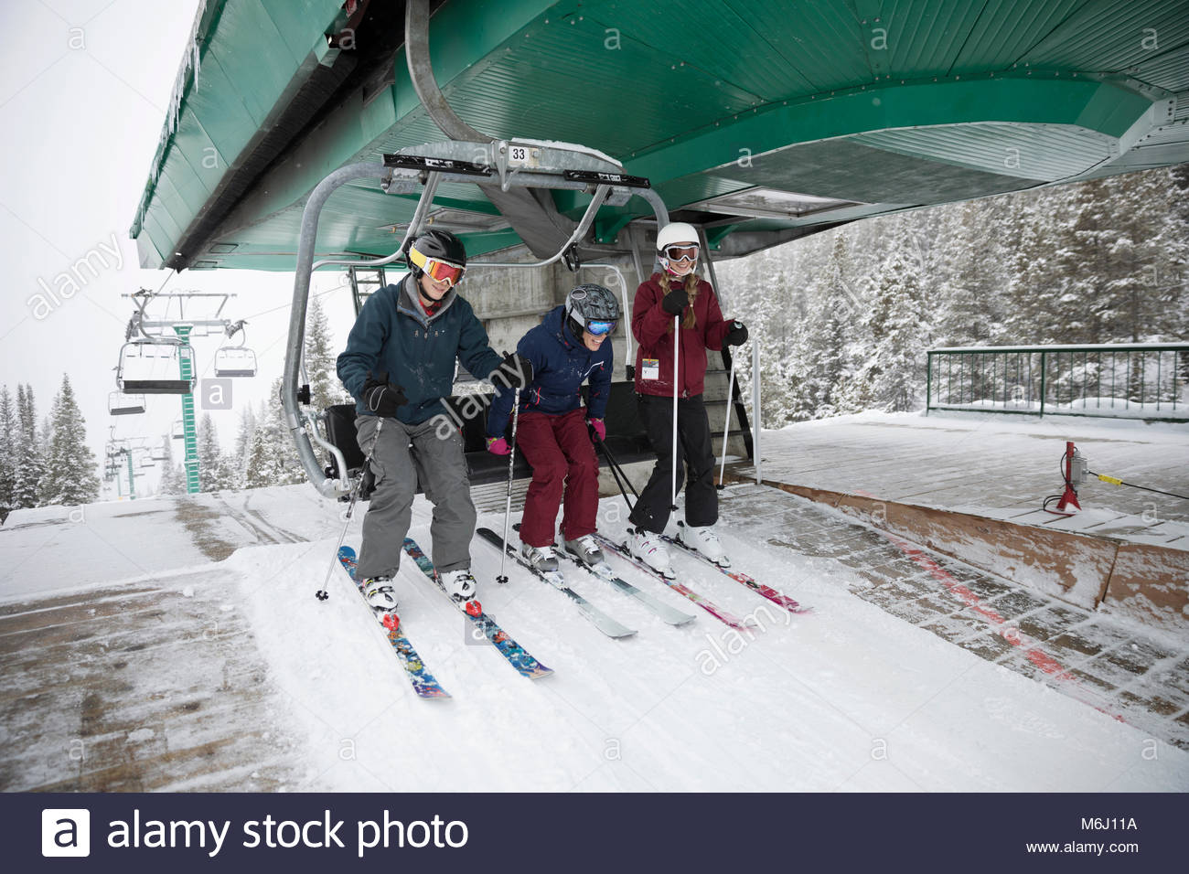 Mature woman standing chair exercise hires stock photography and