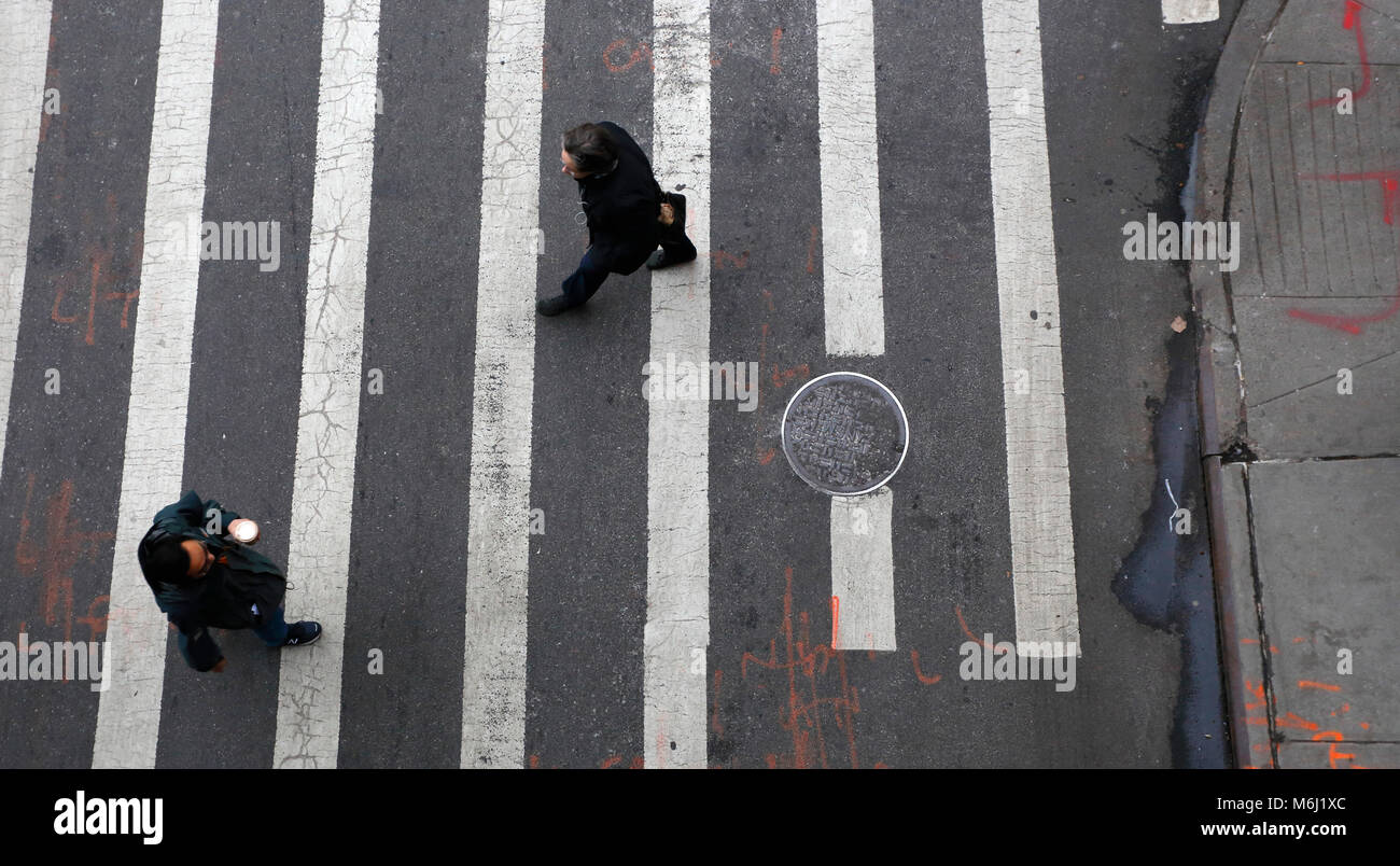 People crossing the street in NYC Stock Photo