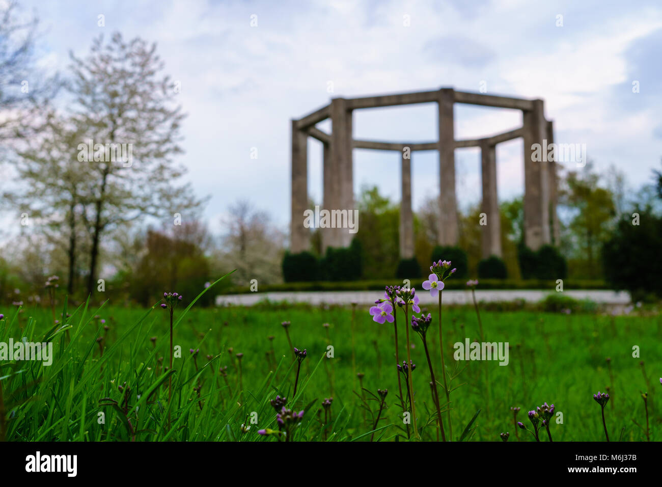 old gasometer in gelsenkirchen nordsternpark and flowers Stock Photo