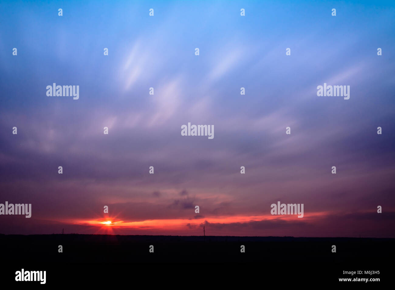 The sunset over western Ukraine was shot at a long-lasting camera 2018 Stock Photo