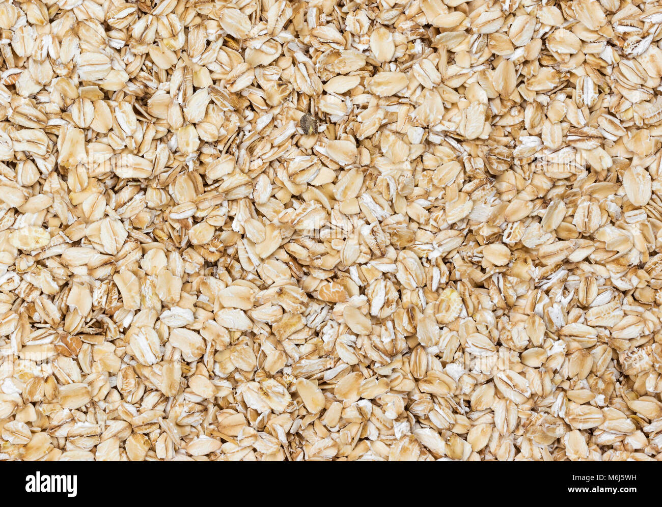 Oat flakes grain texture Stock Photo