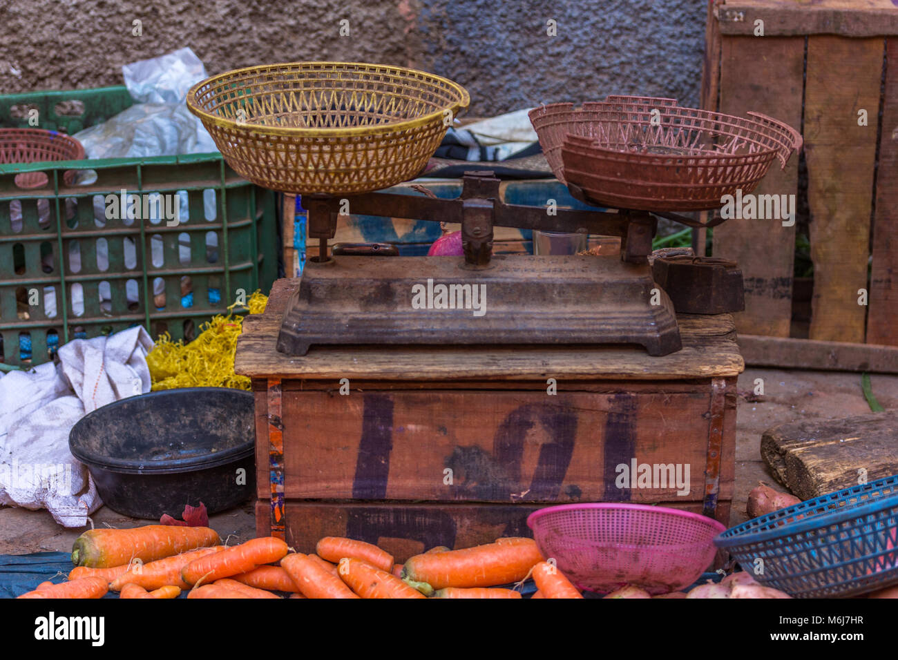 Scales used for weighing fruit and vegetables at a stall in the market, Mellah Quarter, Marrakesh, Morocco. Stock Photo