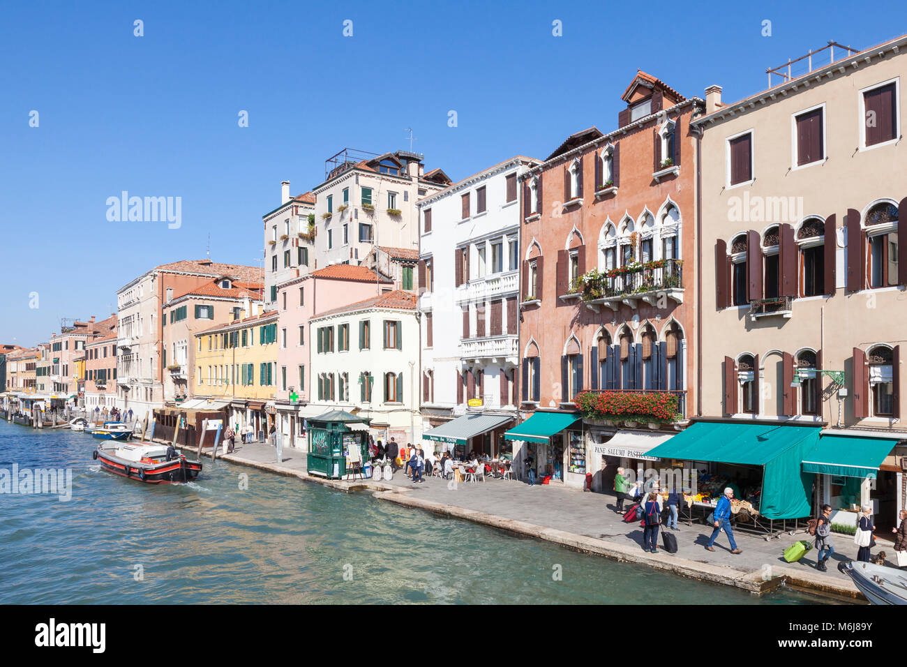 View along the Fondamenta Cannaregio alongside the Cannaregio Canal in summer, Cannaregio, Venice, Veneto, italy Stock Photo