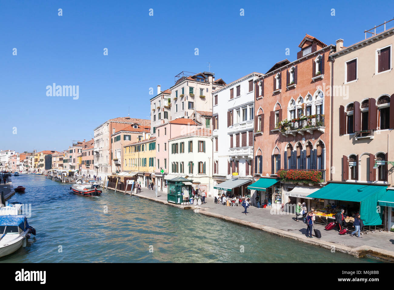 View along the Fondamenta Cannaregio alongside the Cannaregio Canal in summer, Cannaregio, Venice, Veneto, italy Stock Photo
