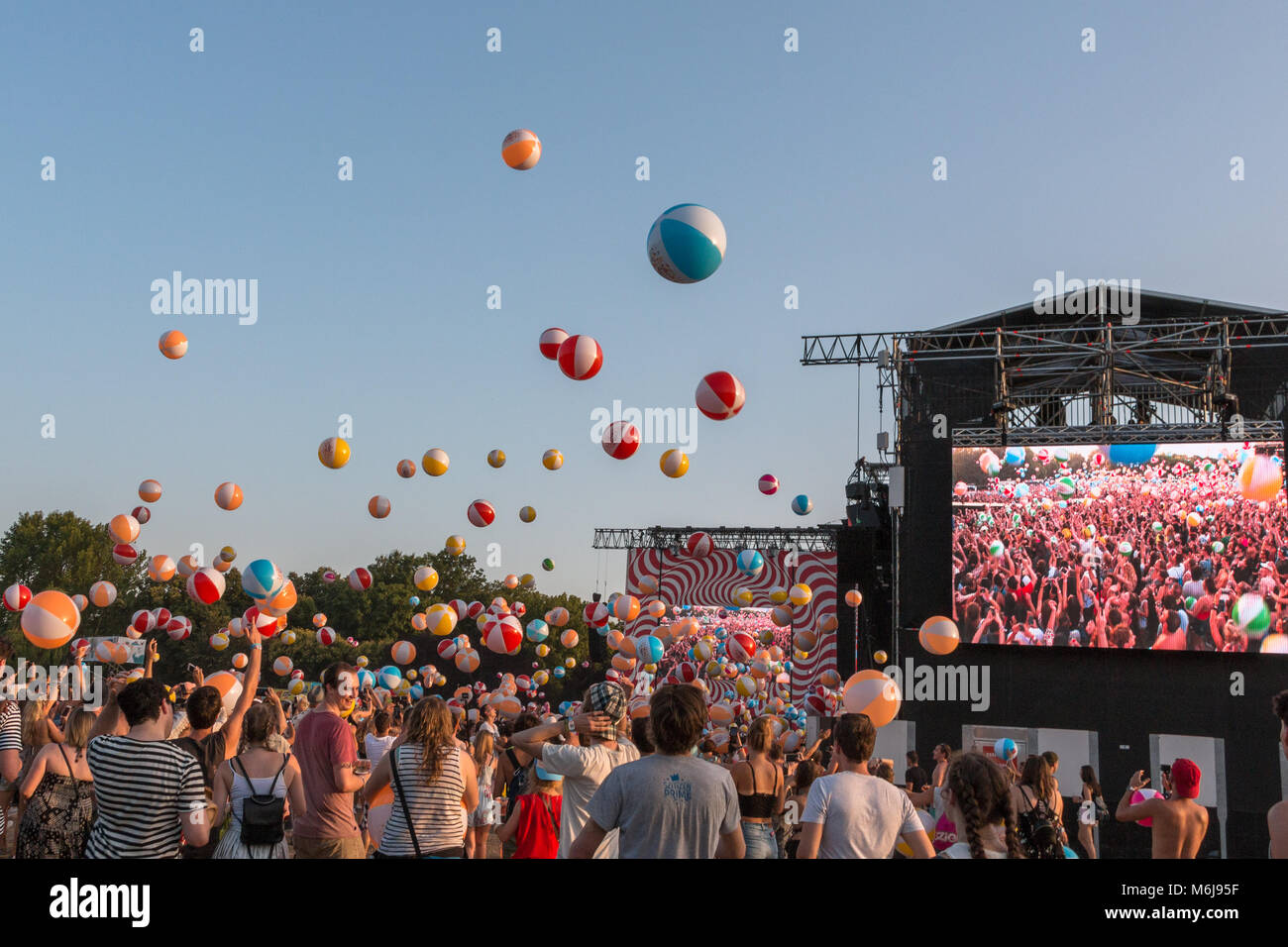 Throwing beach balls at the 2017 Sziget Festival in Budapest, Hungary Stock Photo