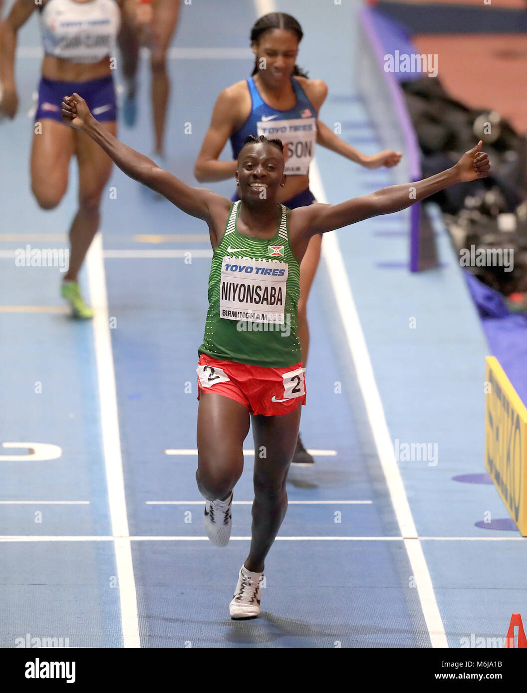 Burundi's Francine Niyonsaba celebrates winning the women's 800m final during day four of the 2018 IAAF Indoor World Championships at The Arena Birmingham. Stock Photo