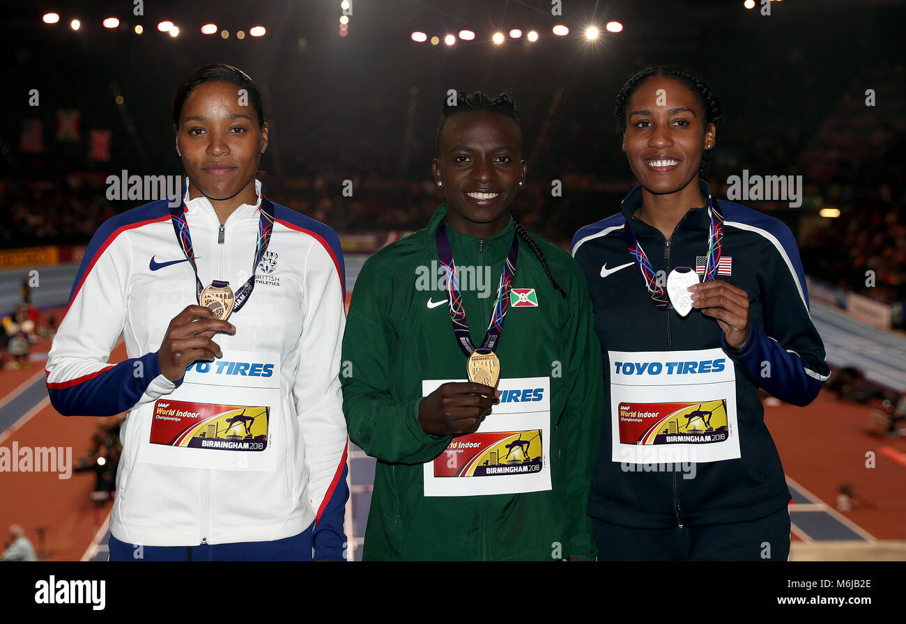 Great Britain’s Shelayna Oskan-Clarke with her bronze medal for the women's 800m final (left) alongside gold medaliist Burundi's Francine Niyonsaba (centre) and silver medallist USA's Ajee Wilson during day four of the 2018 IAAF Indoor World Championships at The Arena Birmingham. Stock Photo