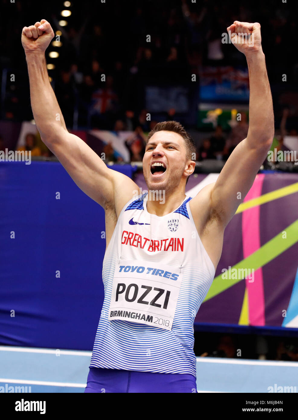 Great Britain's Andrew Pozzi celebrates winning gold in the final of