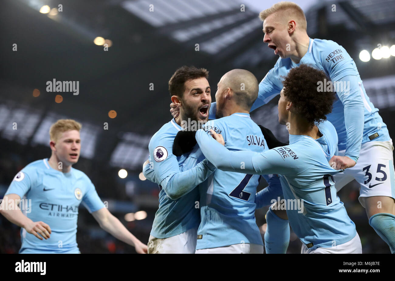 Manchester City's Bernardo Silva (second from left) celebrates with