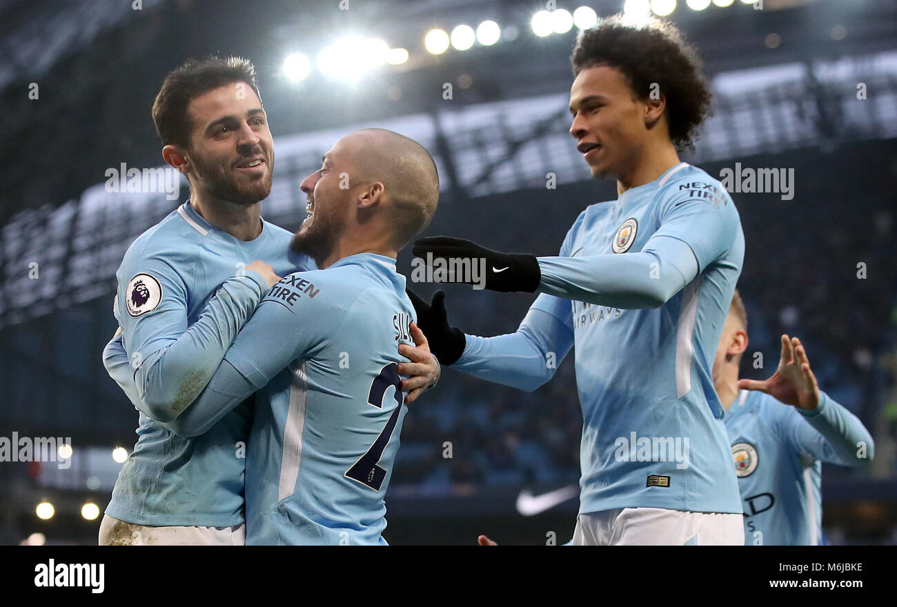 Manchester City's Bernardo Silva celebrates with David Silva, Leroy